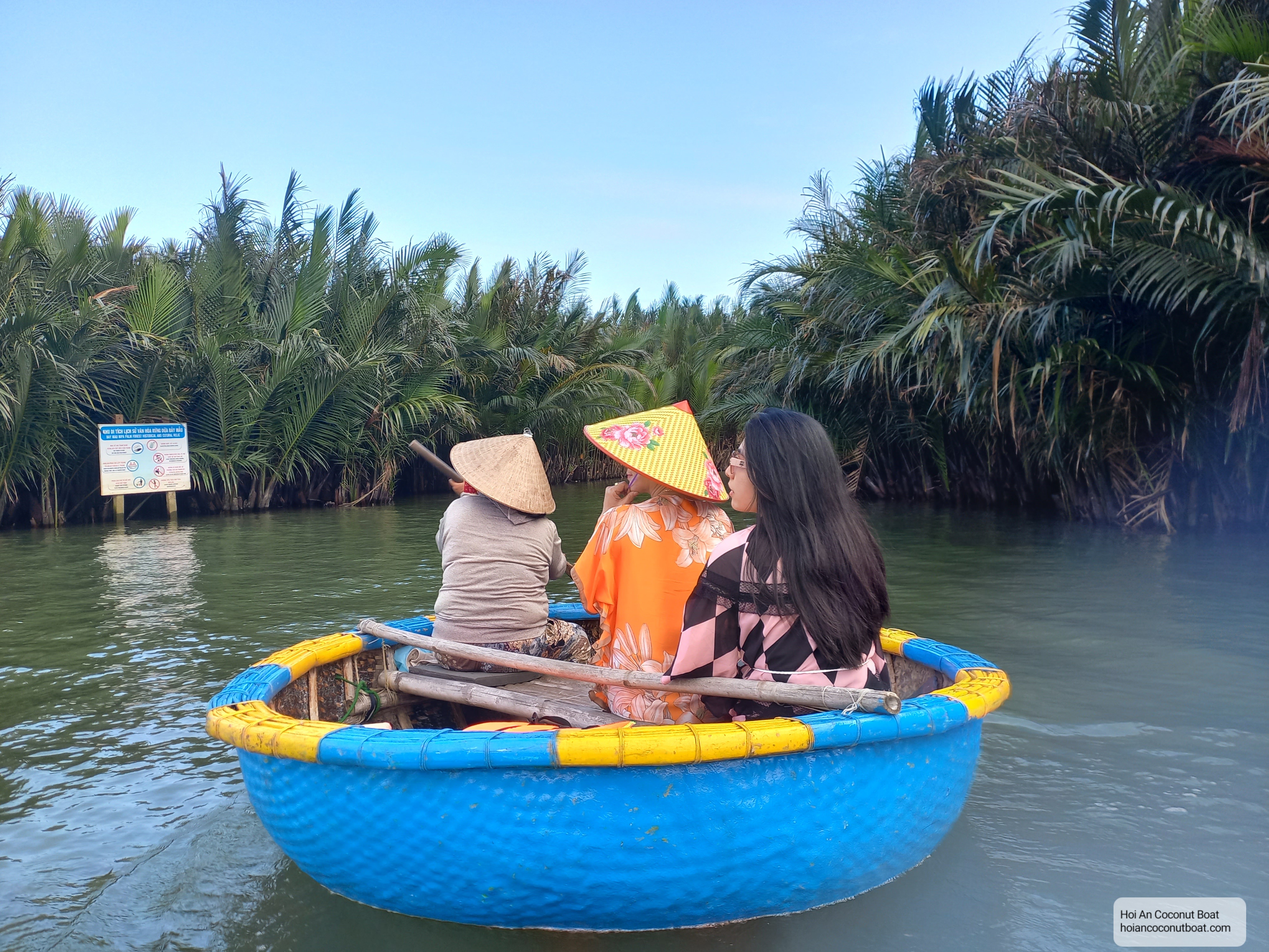 Tourists is on the boat to explore Coconut Forest Hoi An